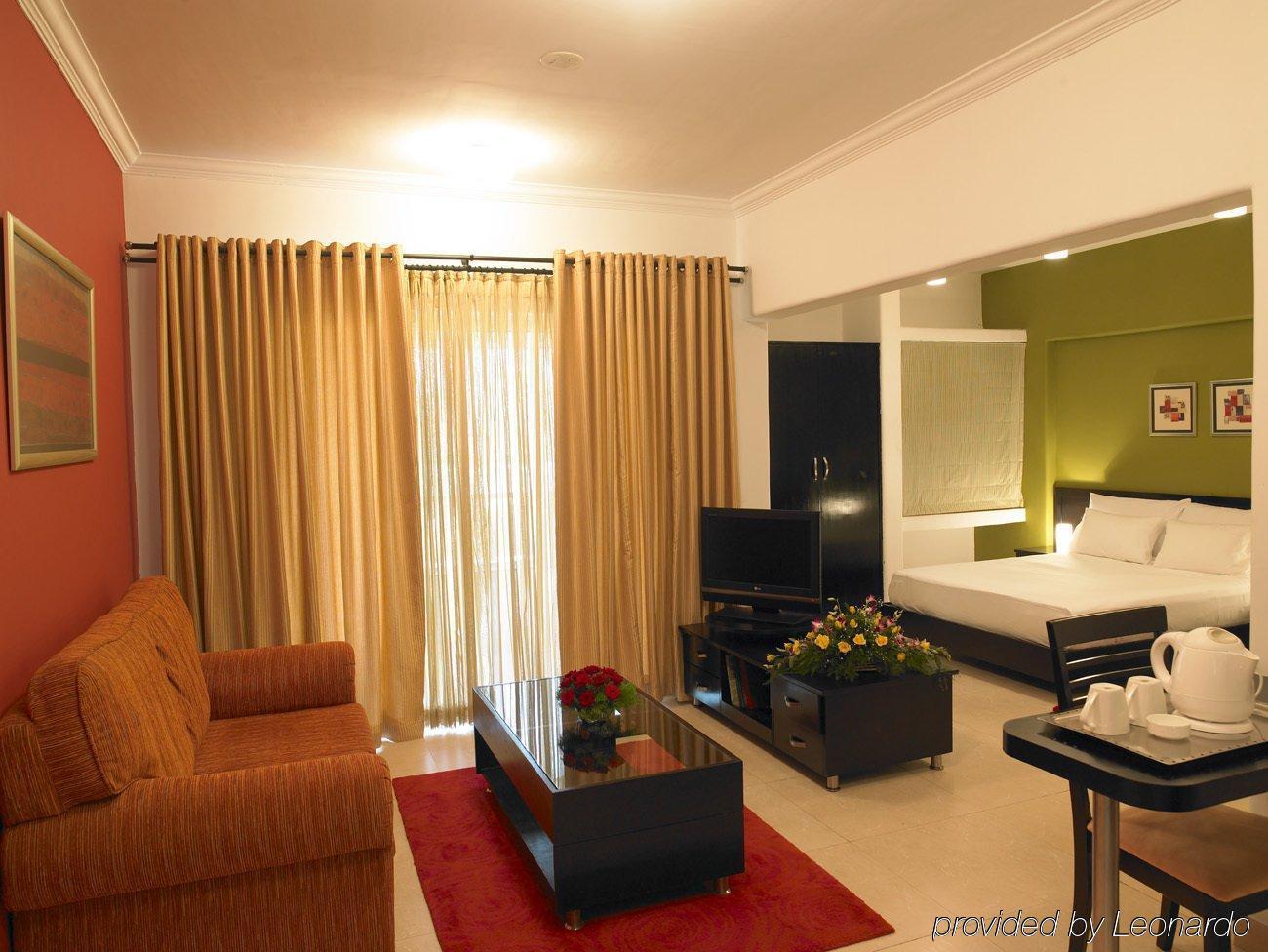 Royal Orchid Golden Suites Púna Pokoj fotografie